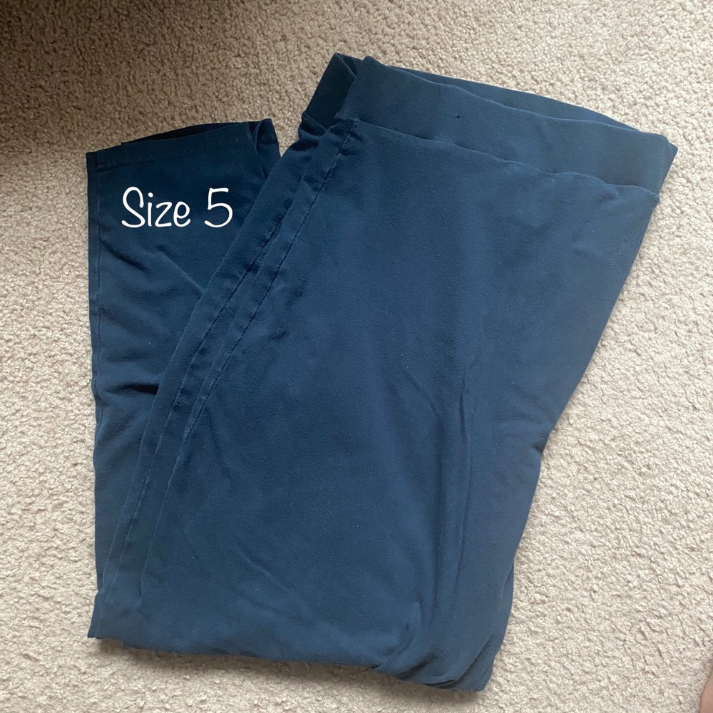 Teal and black leggings from Torrid. Size 5.